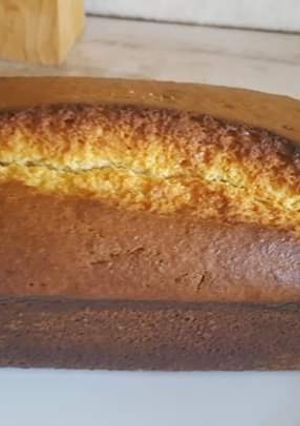 Una foto de Budín de coco con dulce de leche