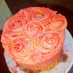 A picture of Banana groundnut cake with buttercream.