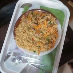 A picture of Fried noodles with vegetables.