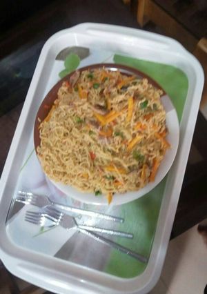 A picture of Fried noodles with vegetables.