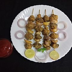 A picture of Mushroom tikka.