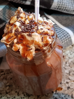 Una foto de Batido de Nocilla y Plátano (con nata montada y queso)