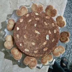 Eid special Almond cake and heart shape cookies A picture of Eid special Almond cake and heart shape cookies.