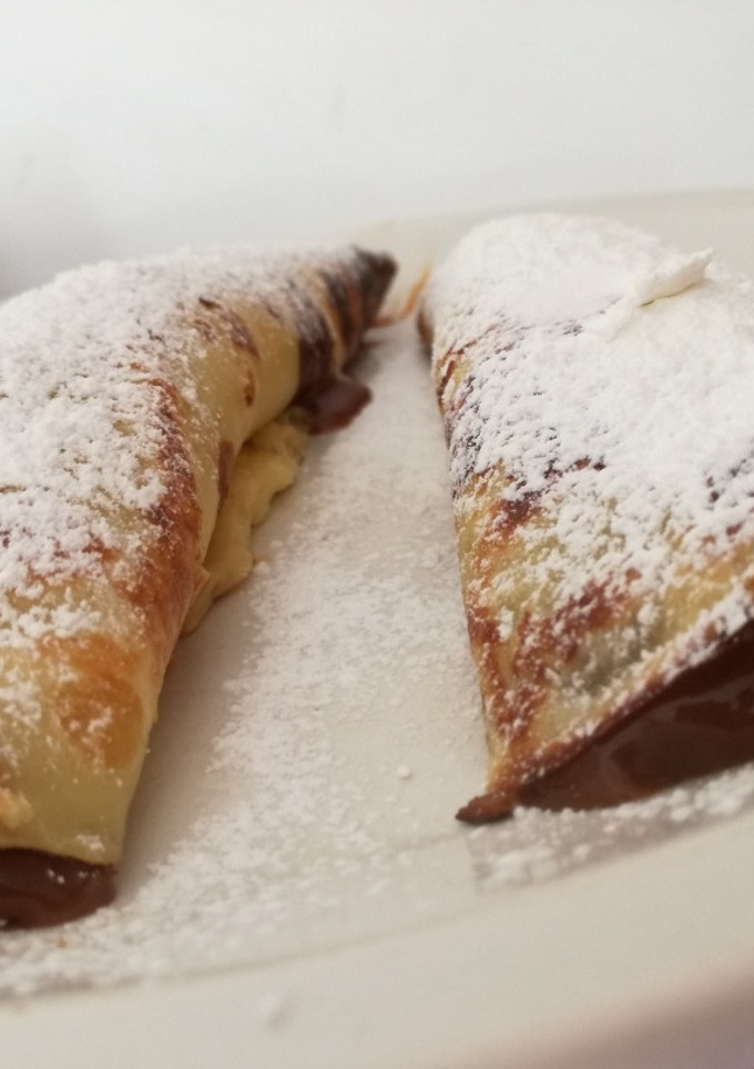 Una foto de Panqueques con dulce de leche