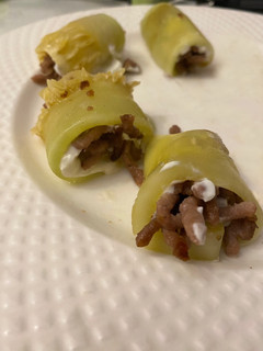 Una foto de Rollitos de calabacín rellenos