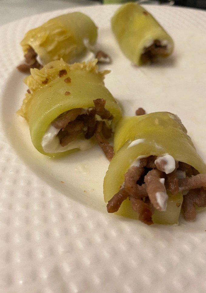 Una foto de Rollitos de calabacín rellenos