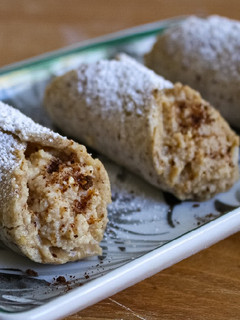 A picture of Baked Hazelnut Cannoli with Coffee Cream.