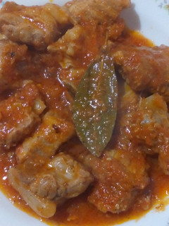 Una foto de Costillas de cerdo con tomate
