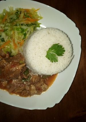 A picture of Rice, beef and cabbage.