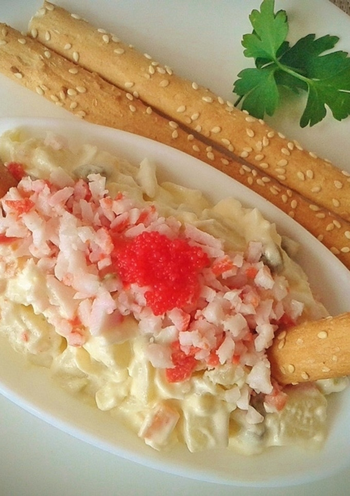 Una foto de Tapa de ensaladilla de surimi de cangrejo