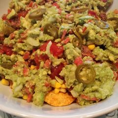 A picture of Loaded vegan nachos.