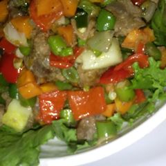 A picture of Diced beef stir fry and veges.