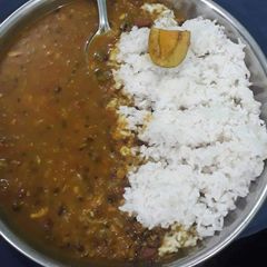 A picture of Dal and rice.