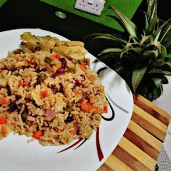 A picture of Raisins,pineapple,veggie rice#mashujaarecipe.