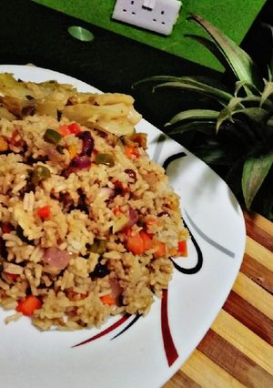 A picture of Raisins,pineapple,veggie rice#mashujaarecipe.