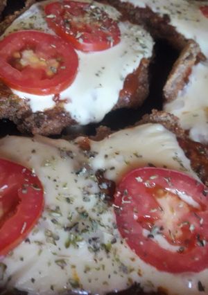 Una foto de Milanesas a la napolitana