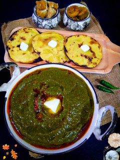 A picture of Sarson Ka Saag with Makki Ki Roti.