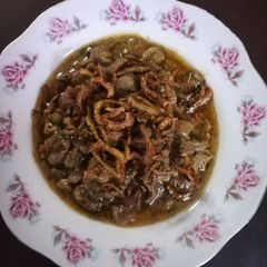 A picture of Karela Gosht.