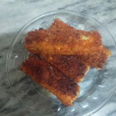 A picture of Bread qeema cheese roll.