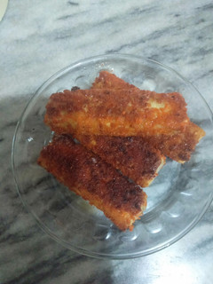 A picture of Bread qeema cheese roll.