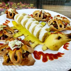 A picture of Roasted carrot and cheese chaat flower.