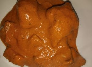 Una foto de Pipián rojo con carne de puerco y chilacayote