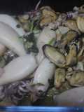 Chipirones y mejillones al ajillo