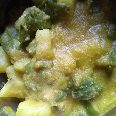 A picture of Jhinge aaloo posto (ridged gourd Potato poppy seeds curry).