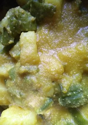 A picture of Jhinge aaloo posto (ridged gourd Potato poppy seeds curry).