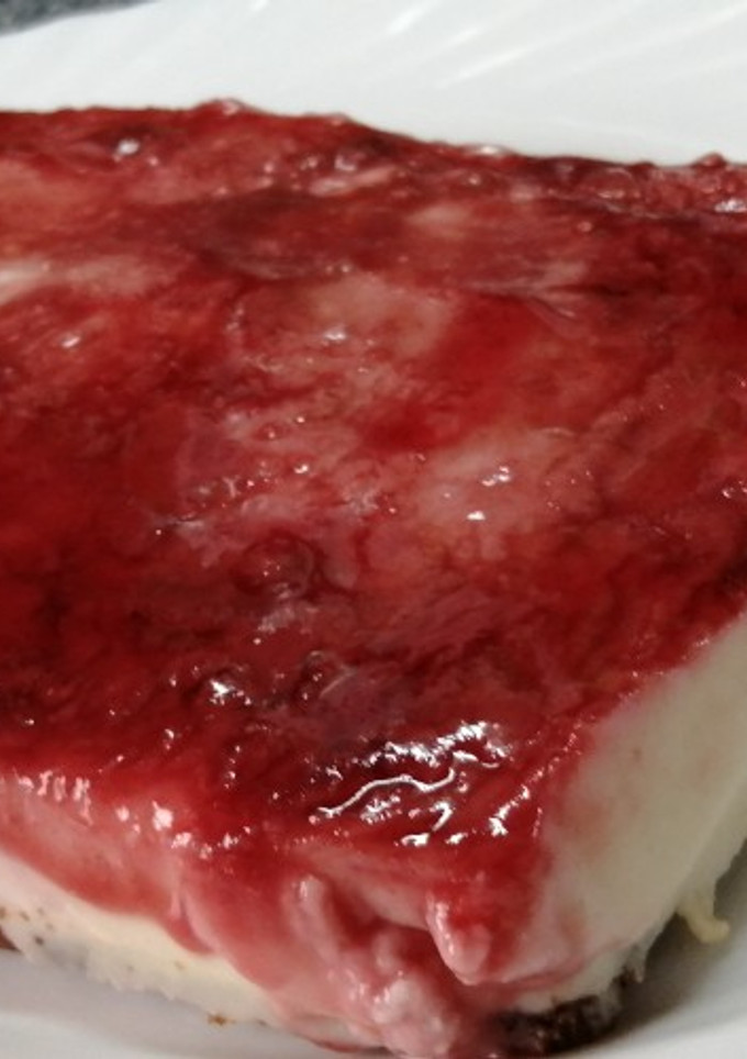Una foto de Tarta de queso con cobertura de piruleta