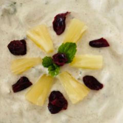 A picture of Pineapple, cranberry and cashew raita.