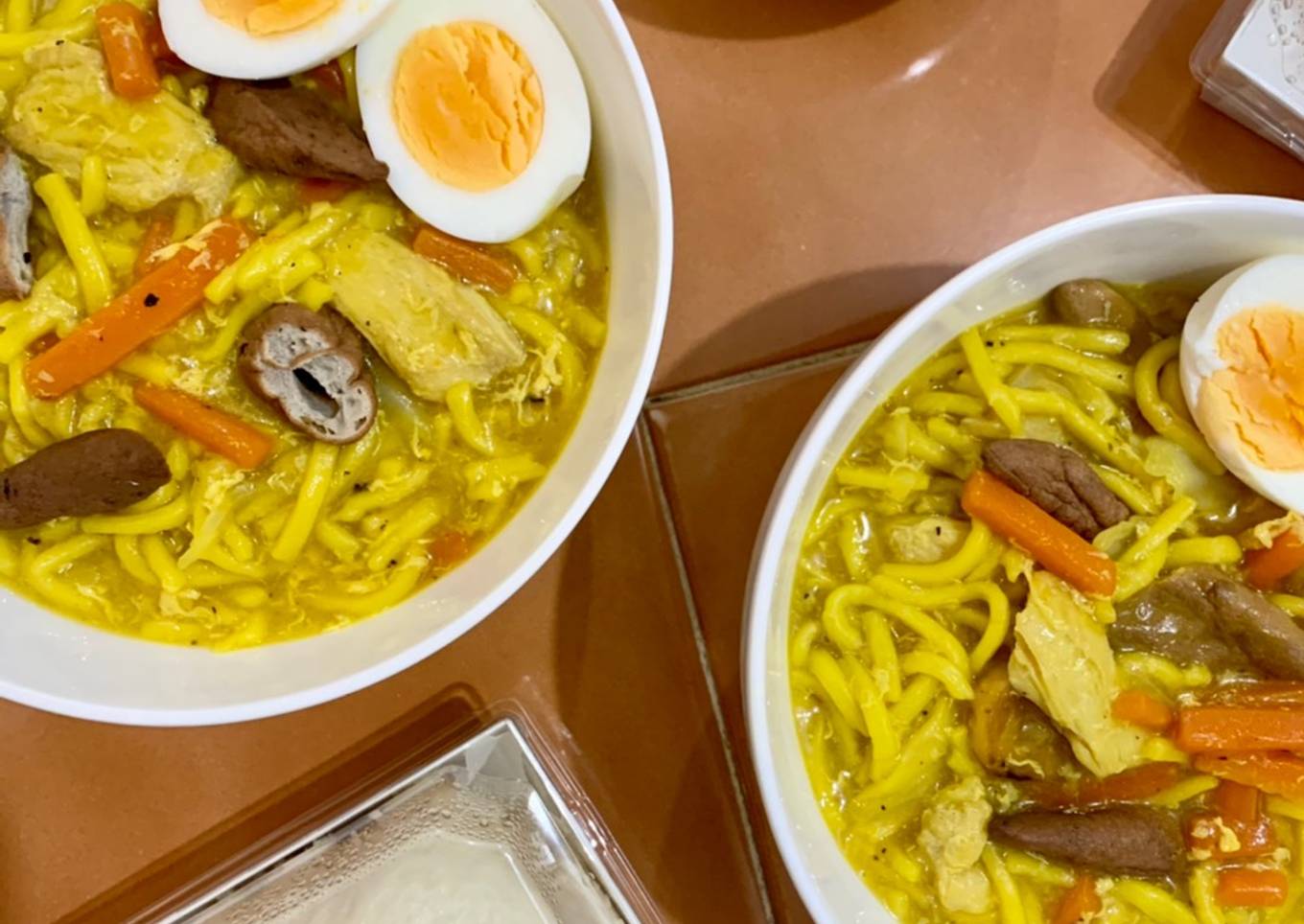 Lomi (Filipino noodle soup with chicken egg)