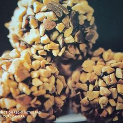 Crushed peanut chocolate ball A picture of Crushed peanut chocolate ball.