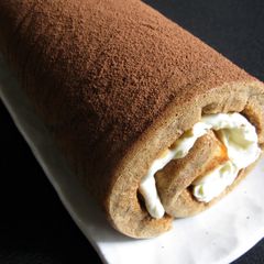 A picture of Coffee Roll Cake with Mascarpone Cream.