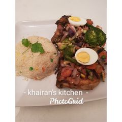 A picture of Couscous and chicken vegetables stir fry.