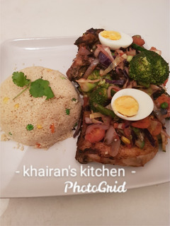 A picture of Couscous and chicken vegetables stir fry.