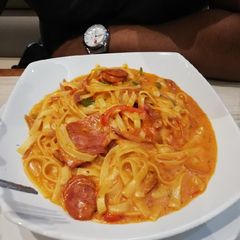 A picture of Spicy bacon/sausage fettuccine.