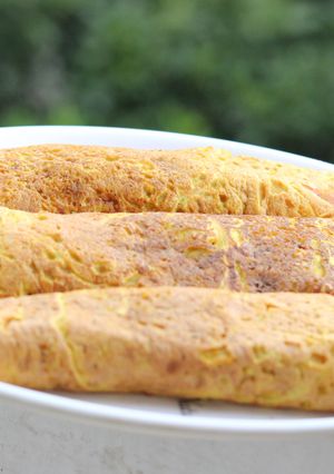 A picture of Moong Dal chilla with roasted Spinach filling.