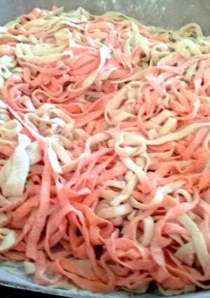 Una foto de Fideos mix (huevos y morrón)