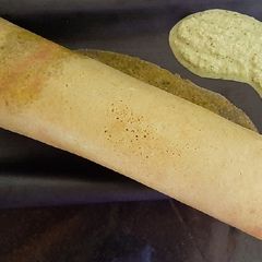 A picture of Kodo Millet (Kodri) Mogar Moog Dal Dosa.
