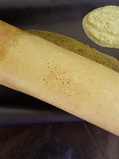 A picture of Kodo Millet (Kodri) Mogar Moog Dal Dosa.