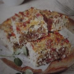 A picture of Crustless Bacon and Vegetable Quiche.