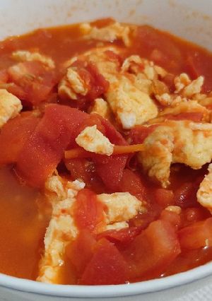 A picture of Tomato with Fried Egg.