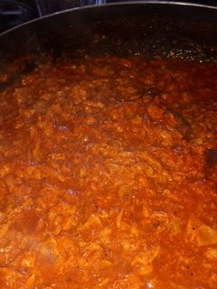 Una foto de Chicharrón prensado en salsa roja mmm