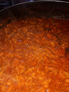 Una foto de Chicharrón prensado en salsa roja mmm