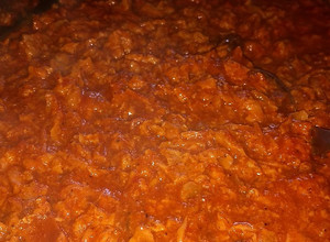 Una foto de Chicharrón prensado en salsa roja mmm
