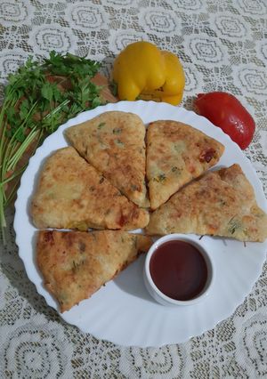 A picture of Bell Pepper & Flour Triangle Fritters.