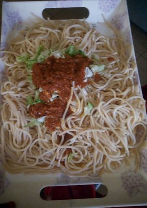 A picture of Plain spaghetti and stew.