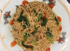 Hình của món Mì xào cà chua rau cải.