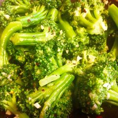 A picture of Sautéed Broccoli with garlic and red pepper flakes .